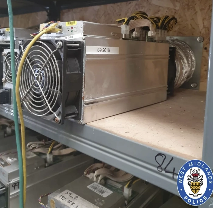 A vast mining farm illuminated under optimized networking conditions ensuring maximum cryptocurrency output