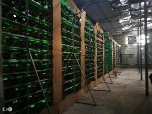A bustling mining farm with rows of miners